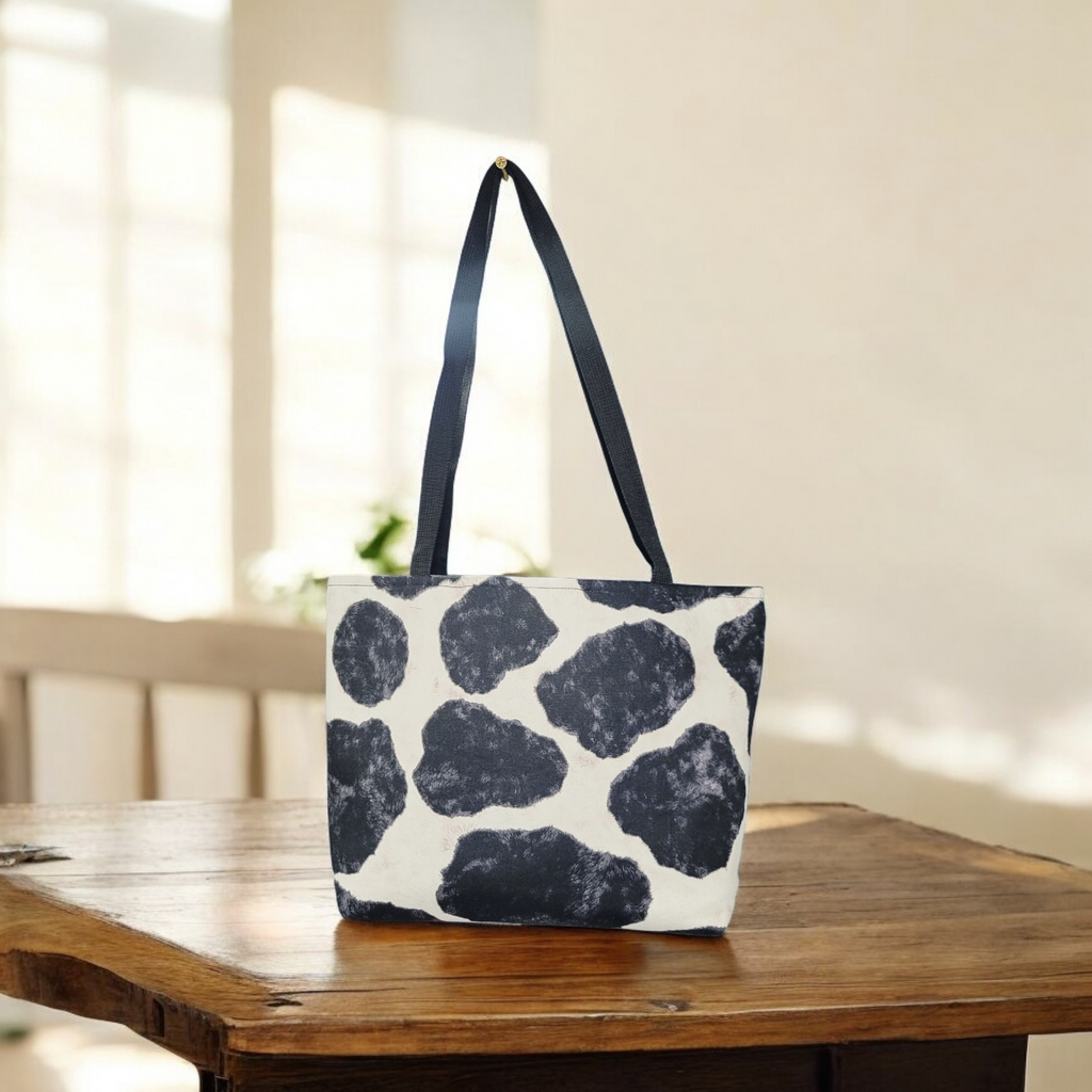 Black and white cow print tote