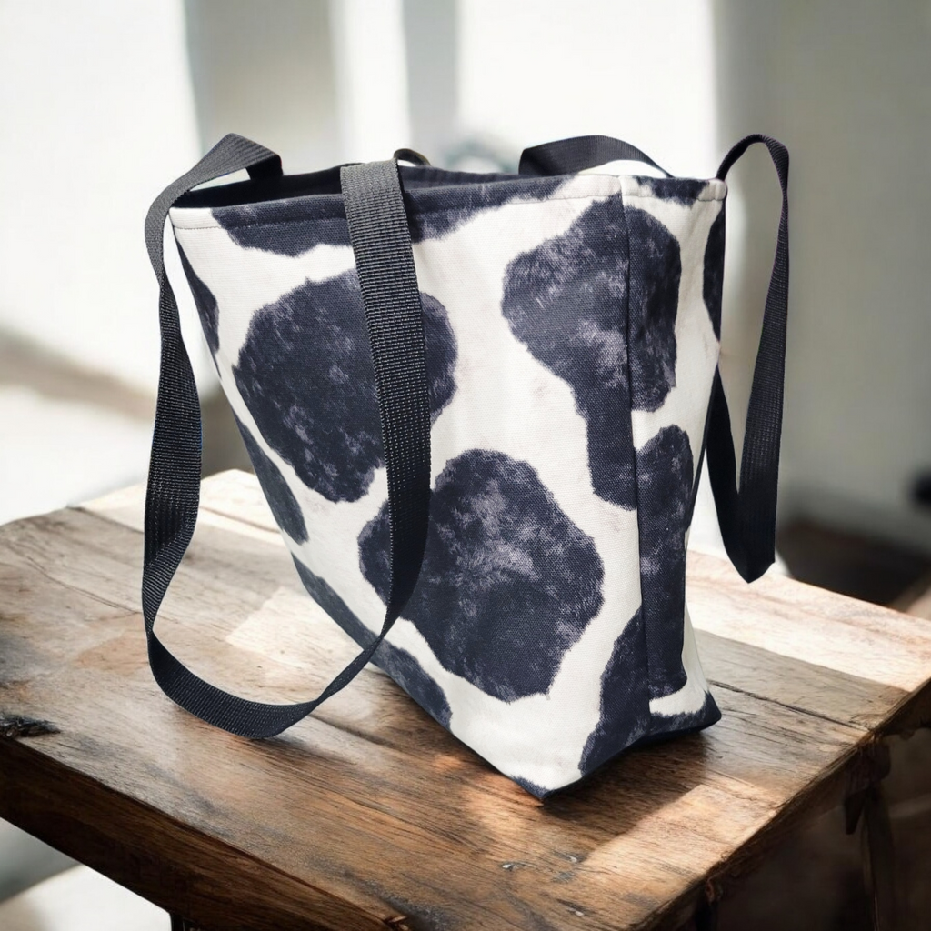 Black and white cow print tote
