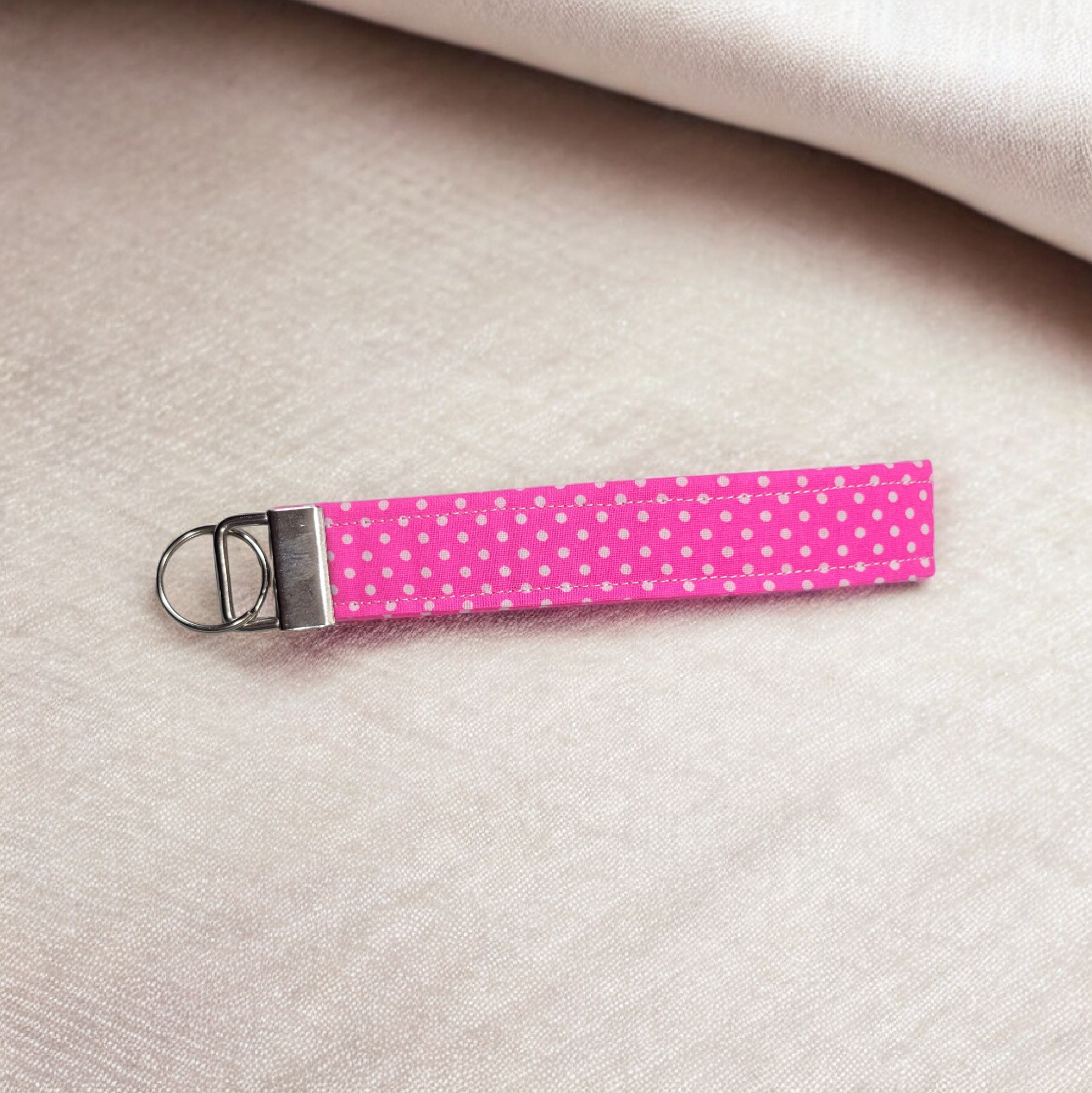 Pink polka dot wristlet keychain